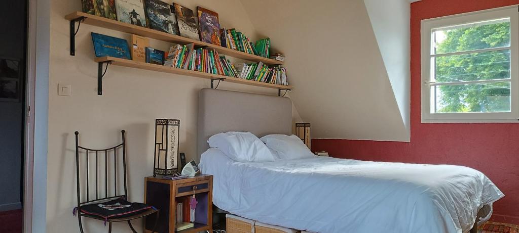 Ein Bett oder Betten in einem Zimmer der Unterkunft Maison de bord de mer - vue mer - location &agrave; la semaine