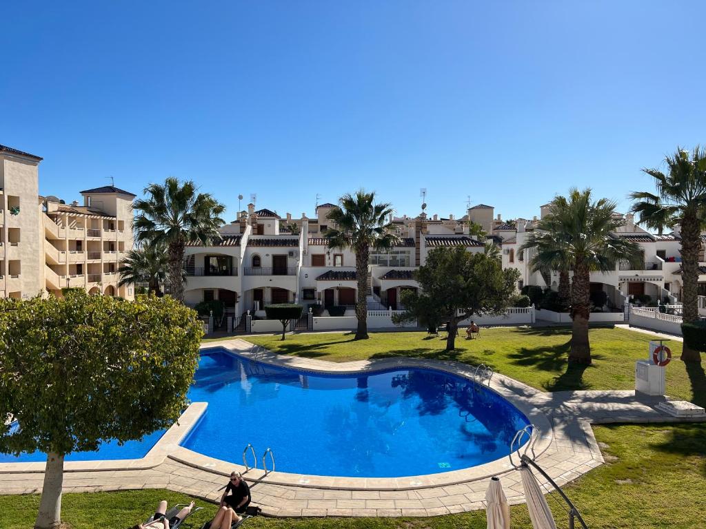 The swimming pool at or close to Sea view apartment 2 BR costa blanca