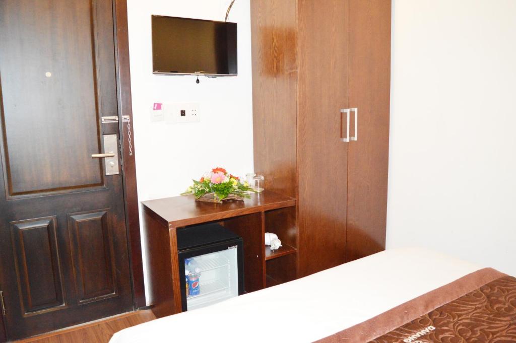 TV a/nebo společenská místnost v ubytování Brown Bean 2 Hotel