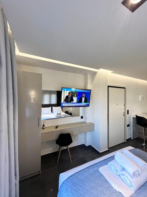 TV a/nebo společenská místnost v ubytování InLofts