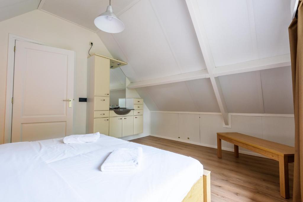 Postel nebo postele na pokoji v ubytování LUXE vakantiehuis voor 6P voorzien van alle gemakken @Veluwe