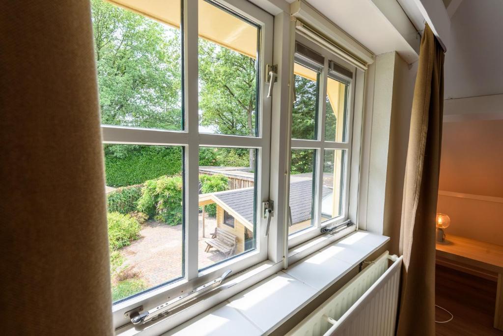 Balkón nebo terasa v ubytování LUXE vakantiehuis voor 6P voorzien van alle gemakken @Veluwe