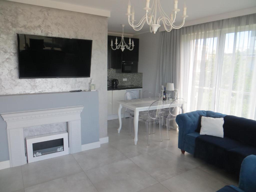 Μια τηλεόραση ή/και κέντρο ψυχαγωγίας στο Lighthouse Apartment