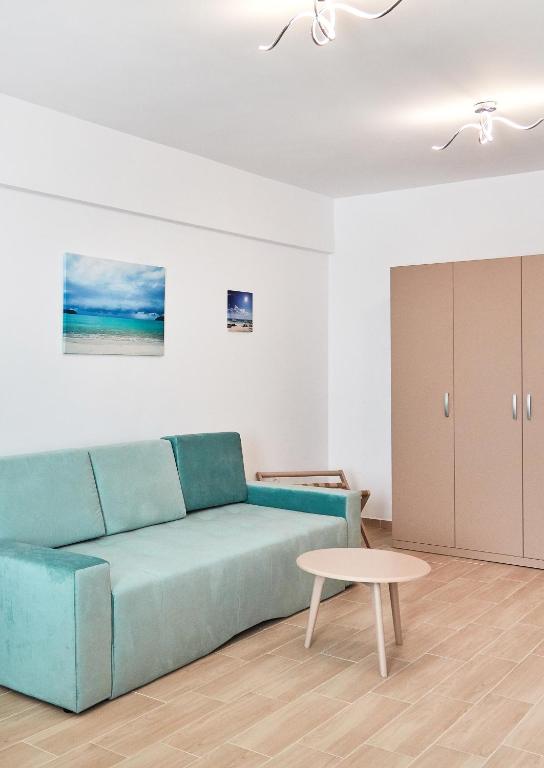 Гостиная зона в Excelsior Apartaments Mamaia Nord