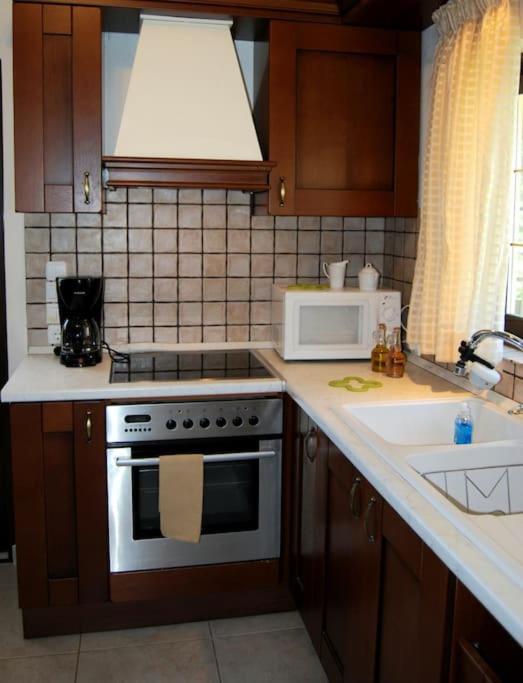 Kuchyň nebo kuchyňský kout v ubytování Luna Apartment, Rafina