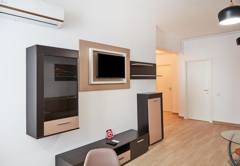 Телевизор и/или развлекательный центр в Excelsior Apartaments Mamaia Nord