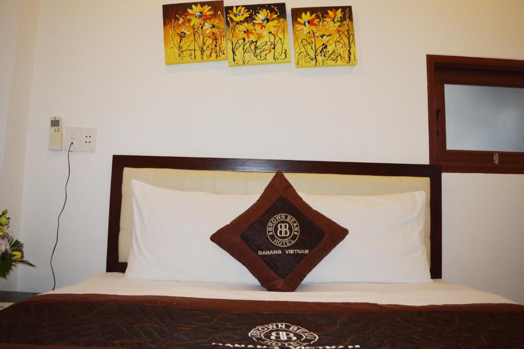 Postel nebo postele na pokoji v ubytování Brown Bean 2 Hotel