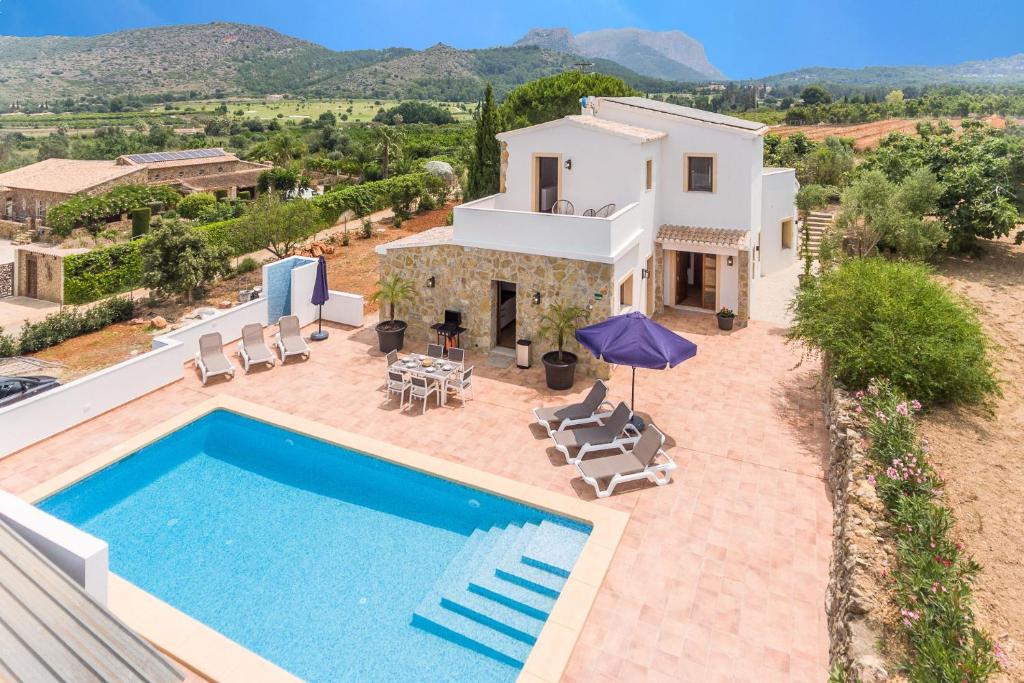 an aerial view of a villa with a swimming pool at Villa La Sella by Rock Rentals in Muntanya la Sella