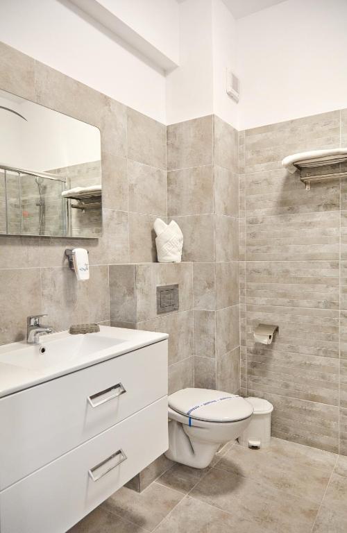 Ванная комната в Excelsior Apartaments Mamaia Nord