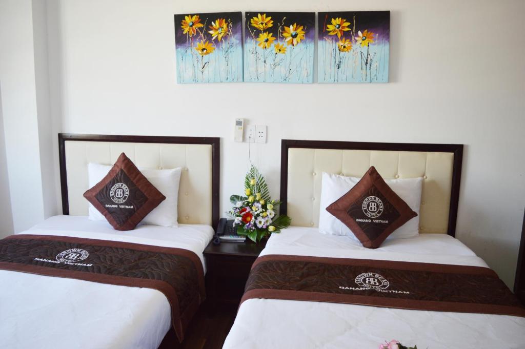 Postel nebo postele na pokoji v ubytování Brown Bean 2 Hotel
