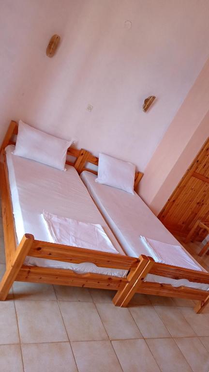 Postel nebo postele na pokoji v ubytování Corfu Bay sea view apartments 100m from the beach