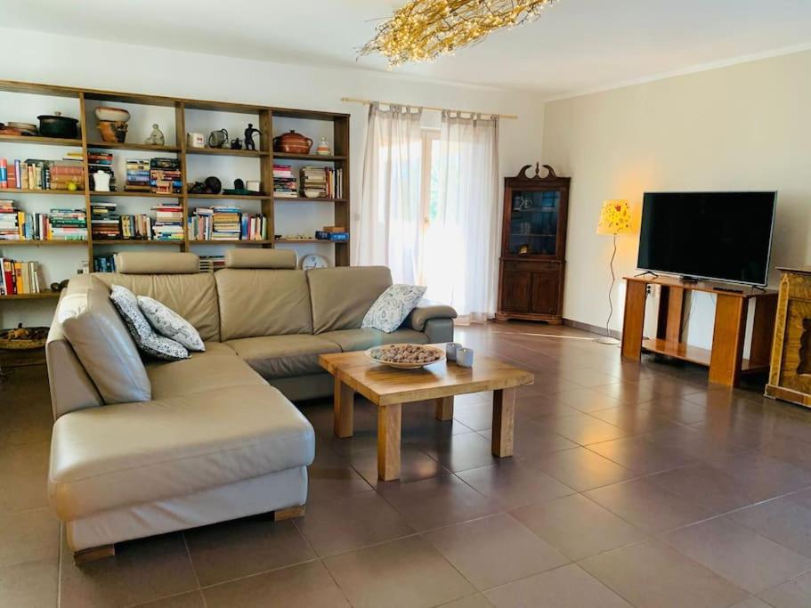 a living room with a couch and a coffee table at Grant's in Labin