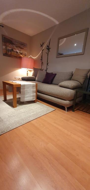 Posezení v ubytování Garden Apartment