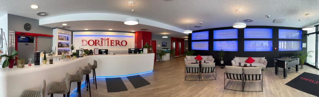 Lounge nebo bar v ubytování DORMERO Hotel Hof