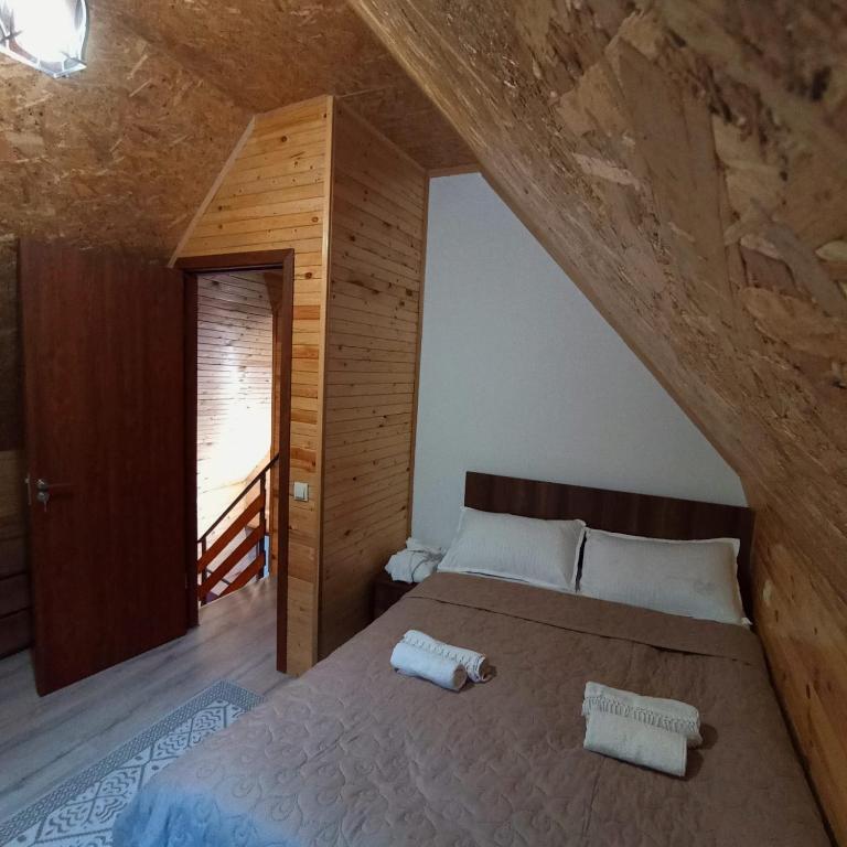 Postel nebo postele na pokoji v ubytování Mountain flower cottage