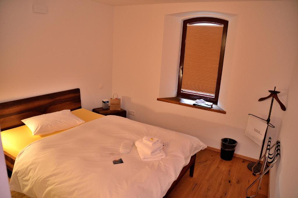 Postel nebo postele na pokoji v ubytování Unique Hotel Fusio