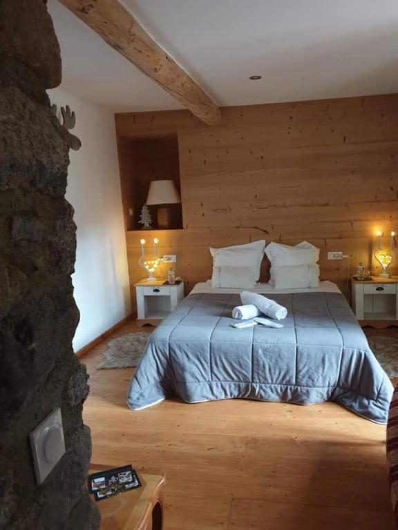 Postel nebo postele na pokoji v ubytování La Petite Chapelle