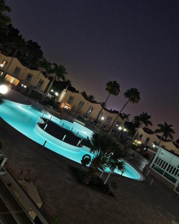 Bazén v ubytování MASPALOMAS GREEN OASIS CLUB playa nebo v jeho okolí
