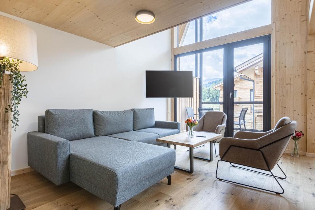 Posezení v ubytování Kreischberg Pool Villas & Penthouses by ALPS RESORTS