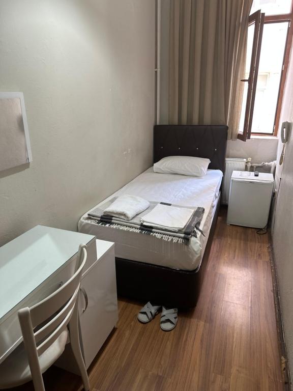 A bed or beds in a room at Hotel Hoyuk