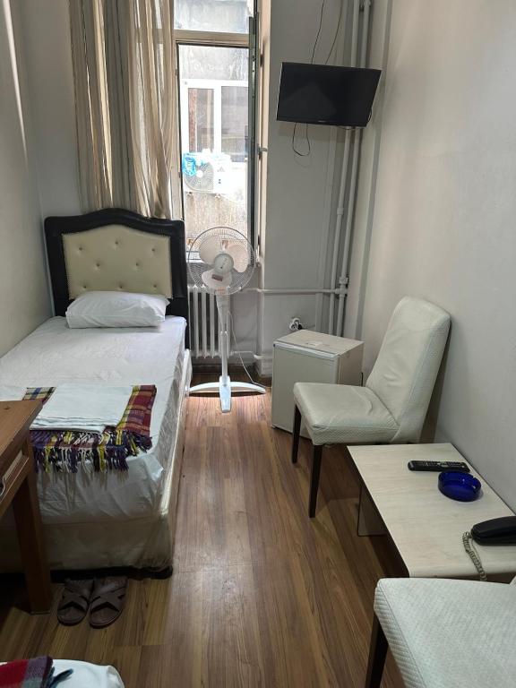 A bed or beds in a room at Hotel Hoyuk