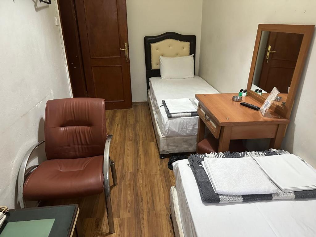 A bed or beds in a room at Hotel Hoyuk