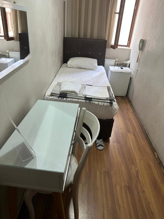 A bed or beds in a room at Hotel Hoyuk