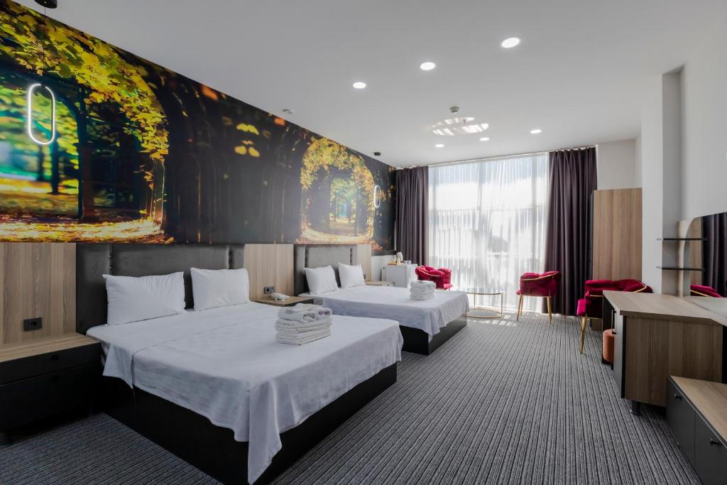Cama ou camas em um quarto em ACAR SMART OTEL