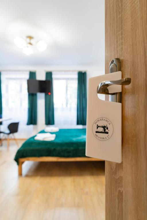 Posteľ alebo postele v izbe v ubytovaní Dom Krawca - pod Chojnikiem
