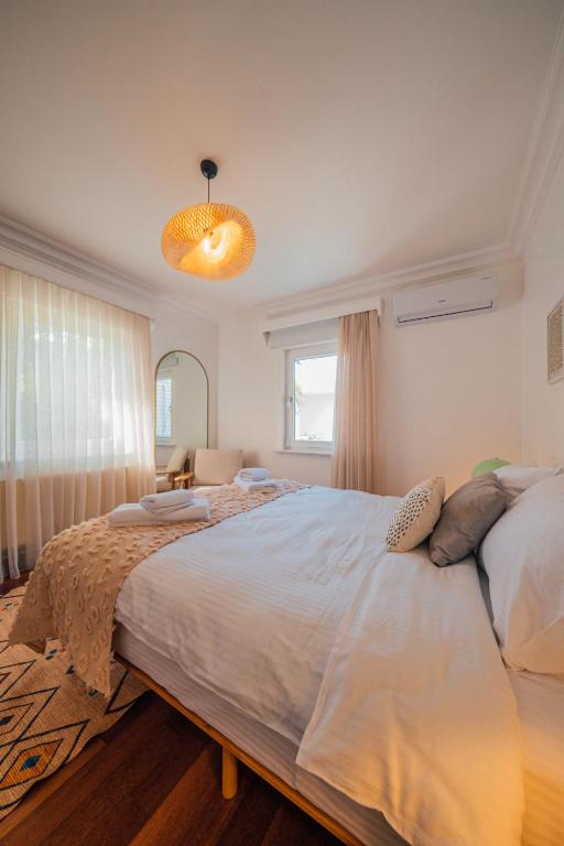 Postel nebo postele na pokoji v ubytování Terra House Sapanca