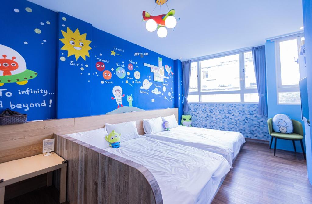 Ένα ή περισσότερα κρεβάτια σε δωμάτιο στο Fun Kids B&B