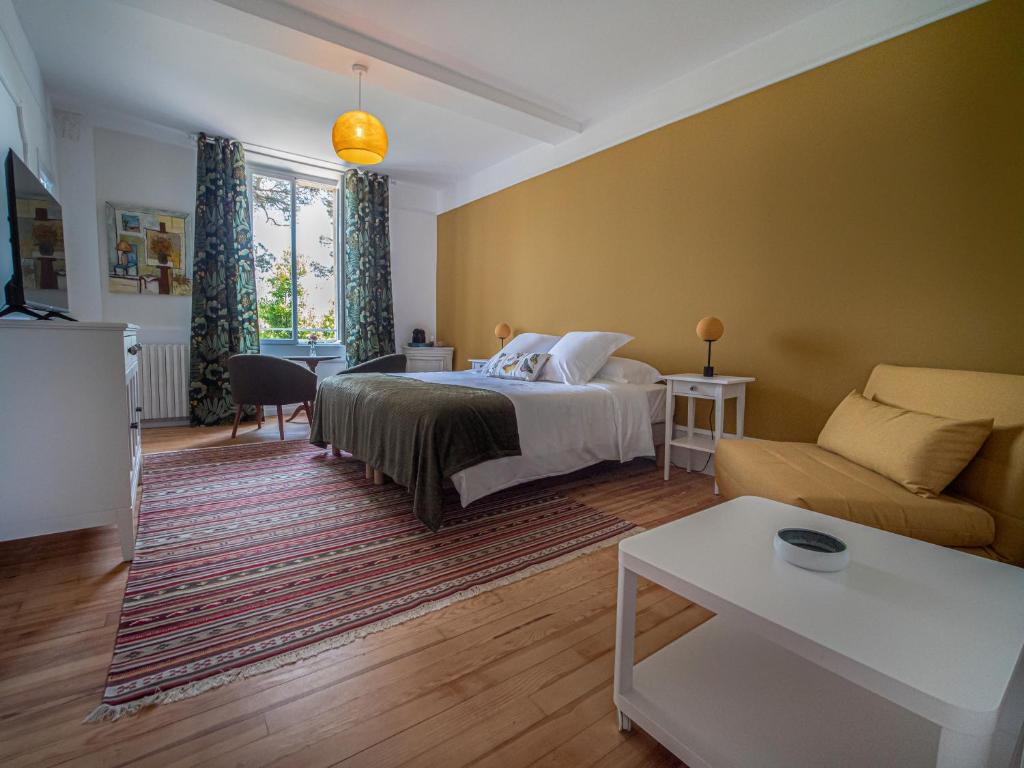 Postel nebo postele na pokoji v ubytování Clos des Oliviers