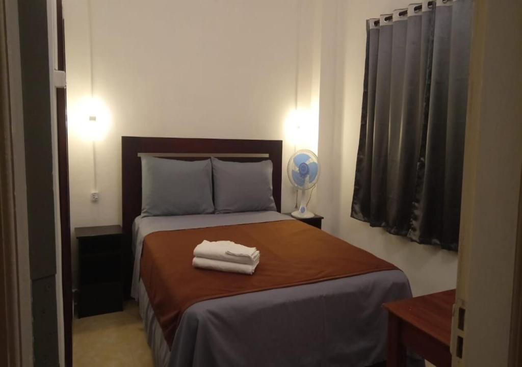 Postel nebo postele na pokoji v ubytování Hotel Arda Bali