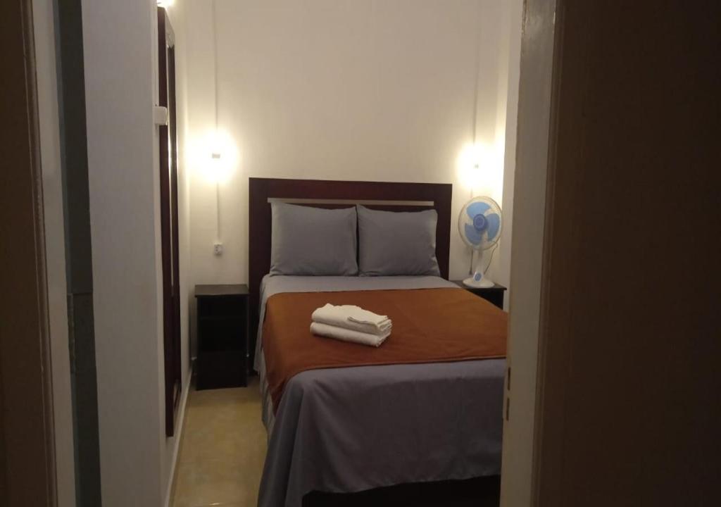 Postel nebo postele na pokoji v ubytování Hotel Arda Bali