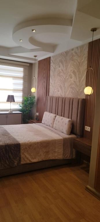 Postel nebo postele na pokoji v ubytování Chambre haut standing