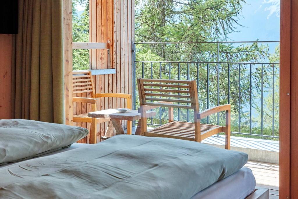 Postel nebo postele na pokoji v ubytování Hotel Waldhaus