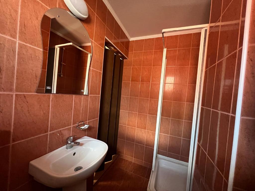 Koupelna v ubytování Casa Roland