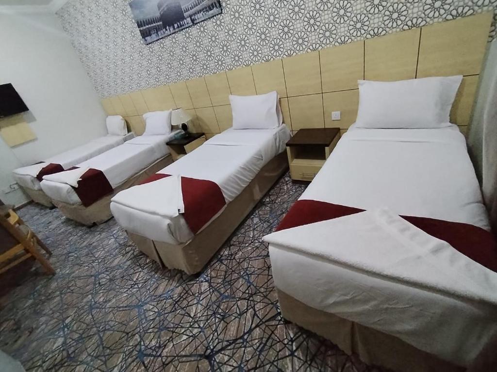 Postel nebo postele na pokoji v ubytování فندق سفير المسك Safeer Almisk Hotel
