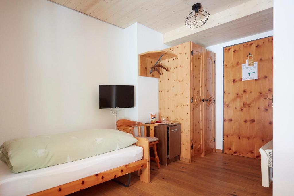 Postel nebo postele na pokoji v ubytování Hotel Waldhaus