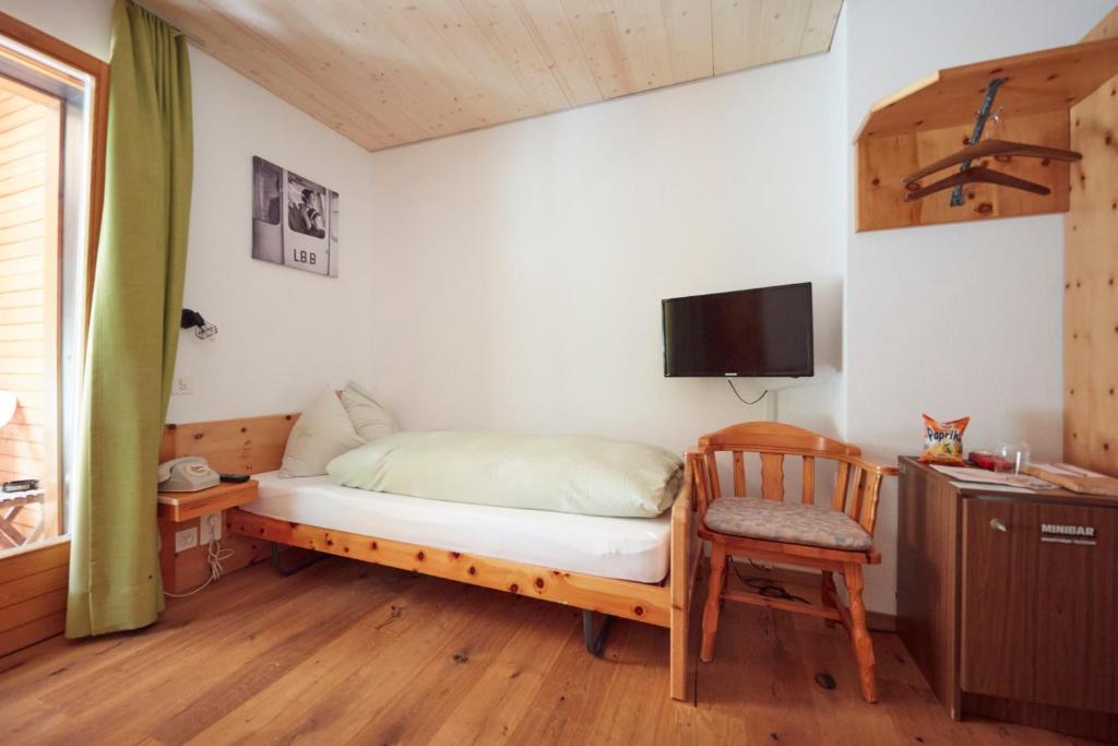Postel nebo postele na pokoji v ubytování Hotel Waldhaus
