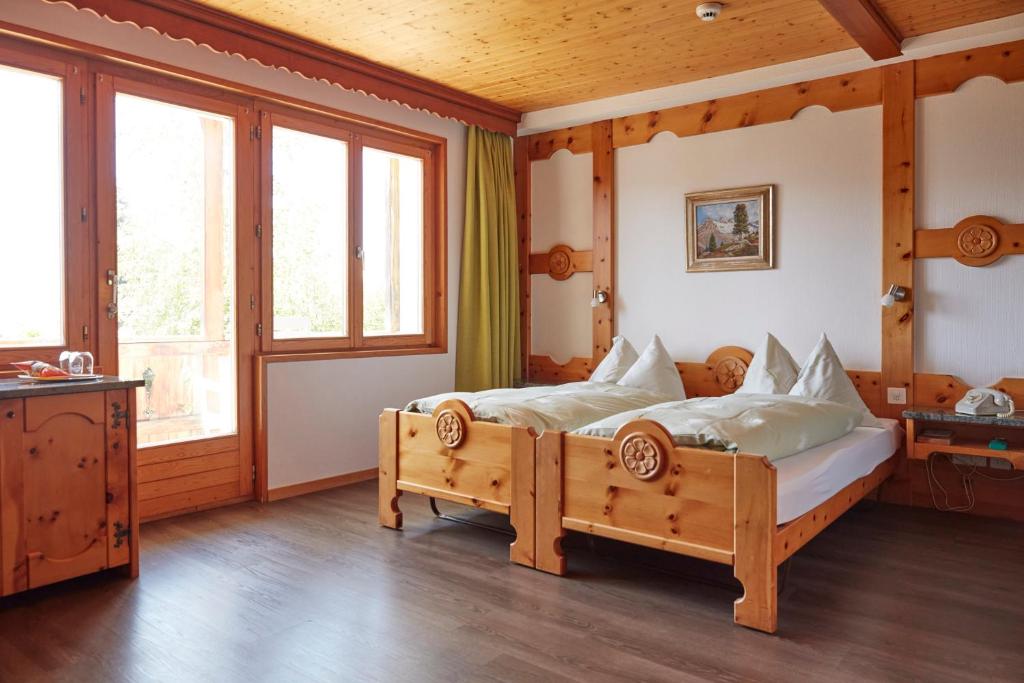 Postel nebo postele na pokoji v ubytování Hotel Waldhaus