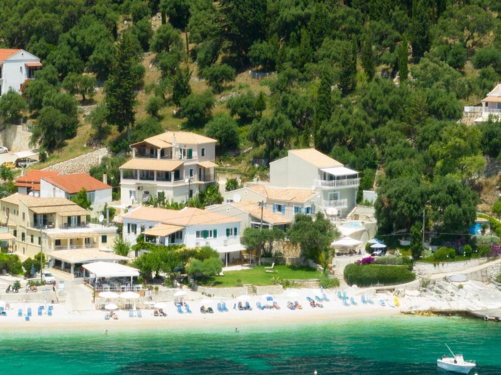 an aerial view of a beach with a group of people at Beach villa Aetos kaminaki Nissaki in Nisaki