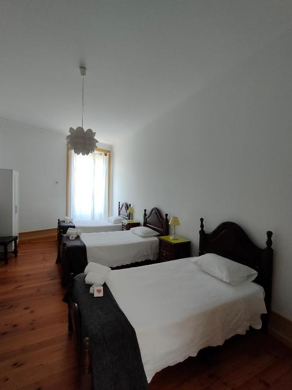 Postel nebo postele na pokoji v ubytování A Vianesa - Guest House