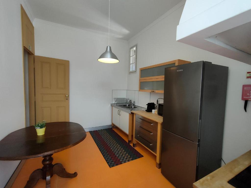 Kuchyň nebo kuchyňský kout v ubytování A Vianesa - Guest House