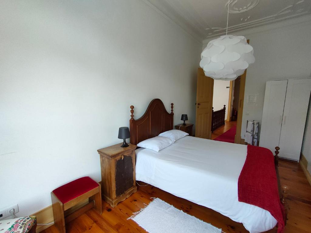 Postel nebo postele na pokoji v ubytování A Vianesa - Guest House