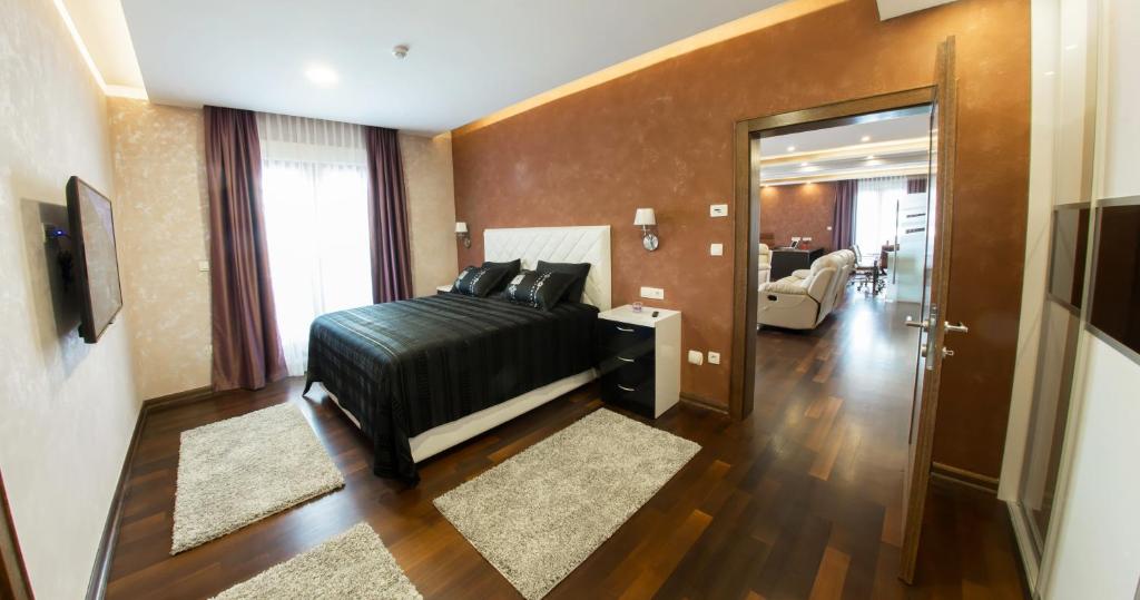 Postel nebo postele na pokoji v ubytování Hotel Mostar