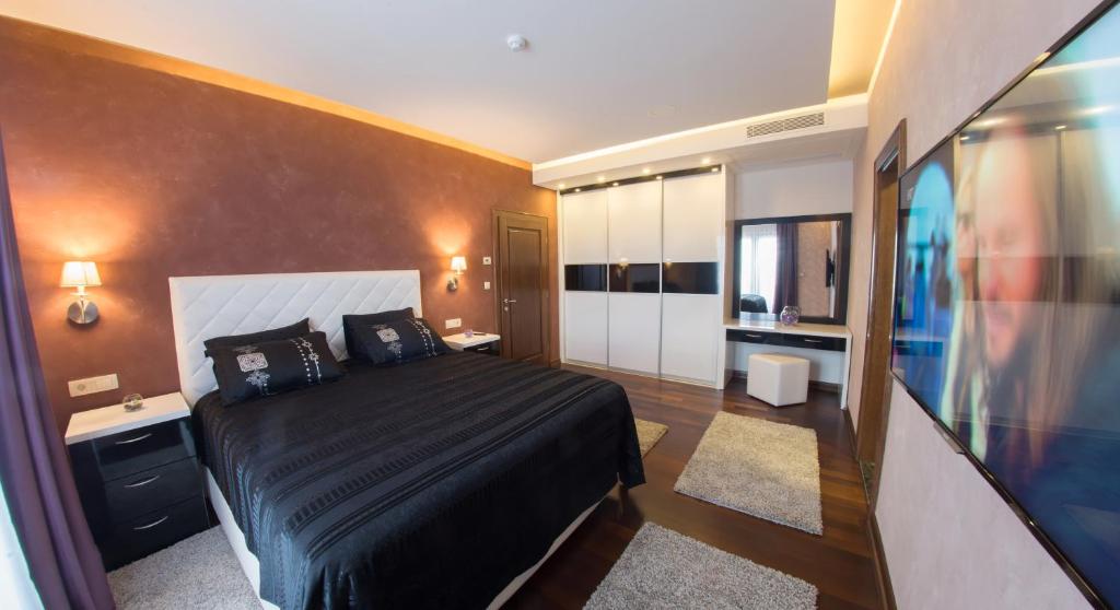 TV a/nebo společenská místnost v ubytování Hotel Mostar