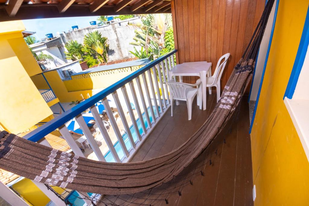 Uma varanda ou terraço em Brisa do Caitá Praia Hotel