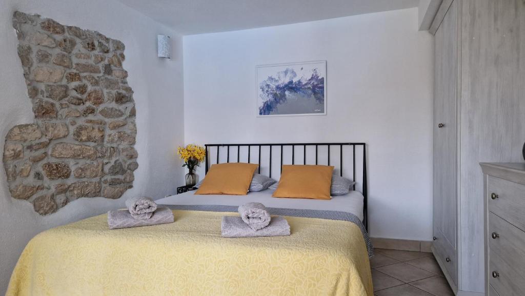 Postel nebo postele na pokoji v ubytování Apartman Karla