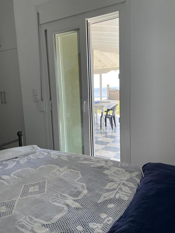 Postel nebo postele na pokoji v ubytování Seafront Apartment